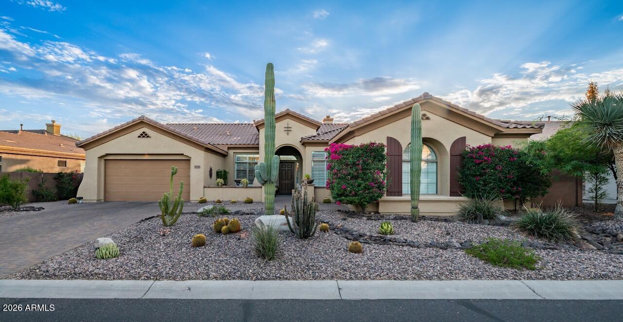 40316 North Lytham Way Phoenix, AZ 85086 - Photo 62 of 66 a front view of a house with garden