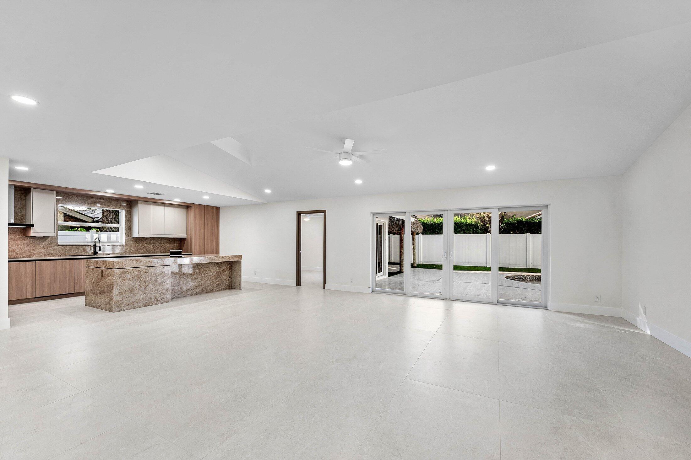1380 Southwest 1st Street Boca Raton, FL 33486 - Photo 15 of 50 a view of kitchen with refrigerator and window