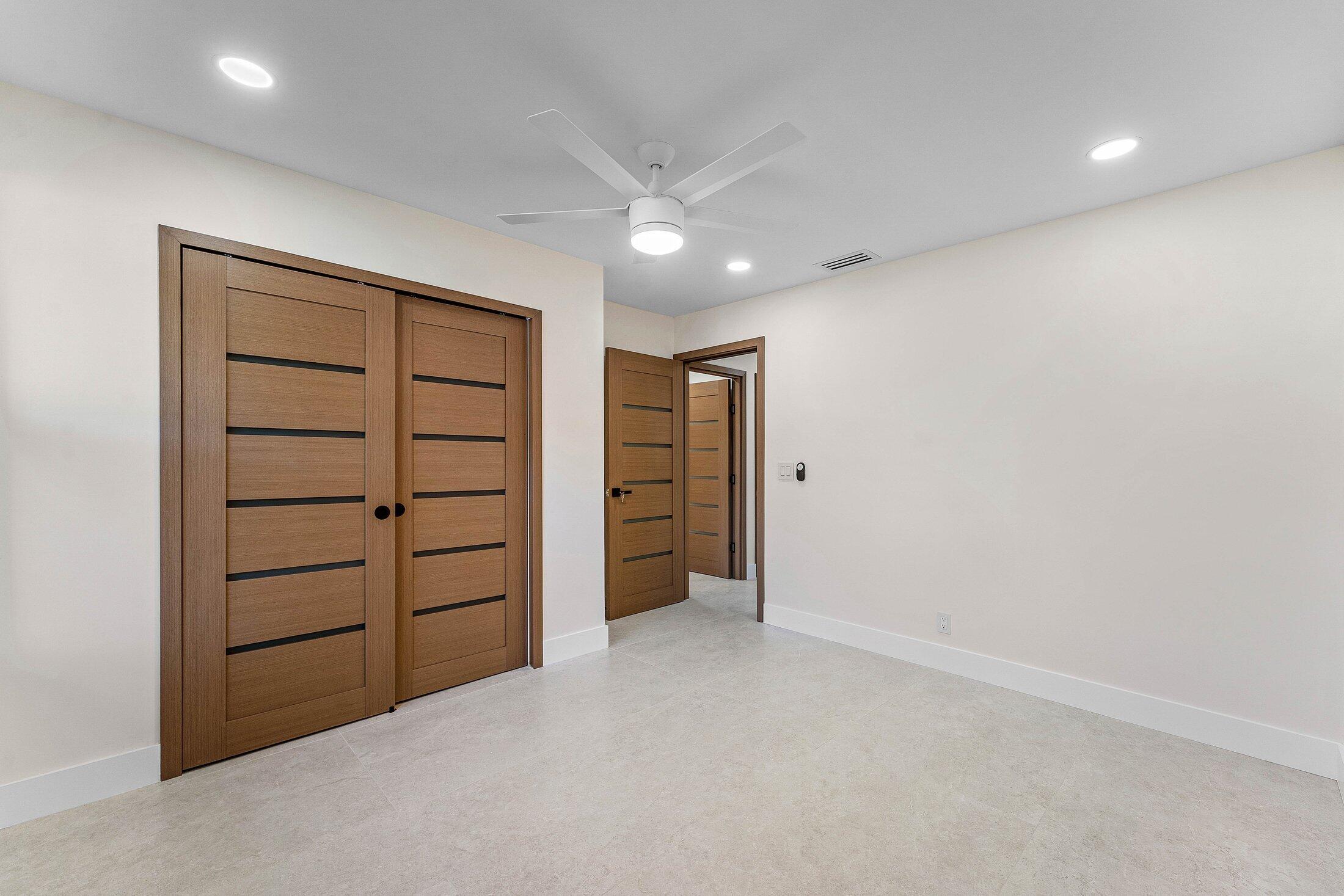 1380 Southwest 1st Street Boca Raton, FL 33486 - Photo 21 of 50 a view of an empty room with closet and stairs