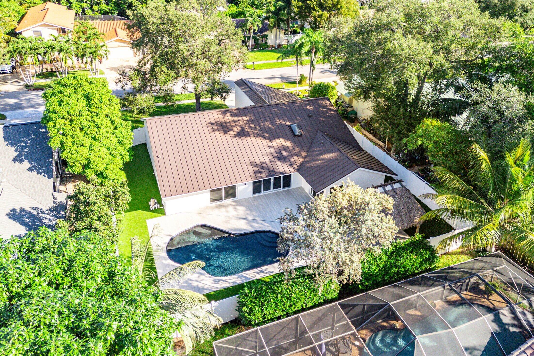1380 Southwest 1st Street Boca Raton, FL 33486 - Photo 43 of 50 an aerial view of a house with garden space and street view