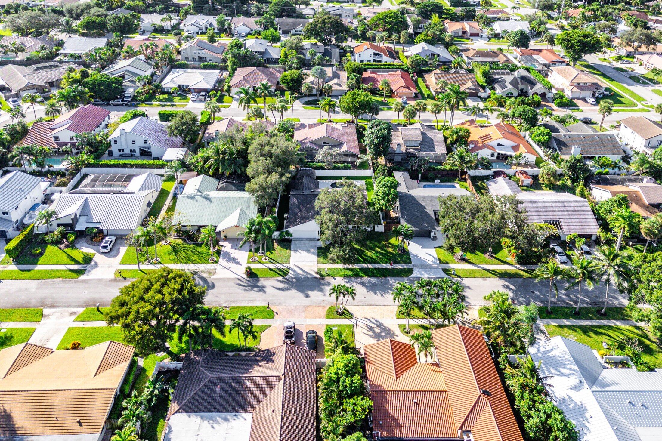 1380 Southwest 1st Street Boca Raton, FL 33486 - Photo 50 of 50 an aerial view of residential houses with outdoor space