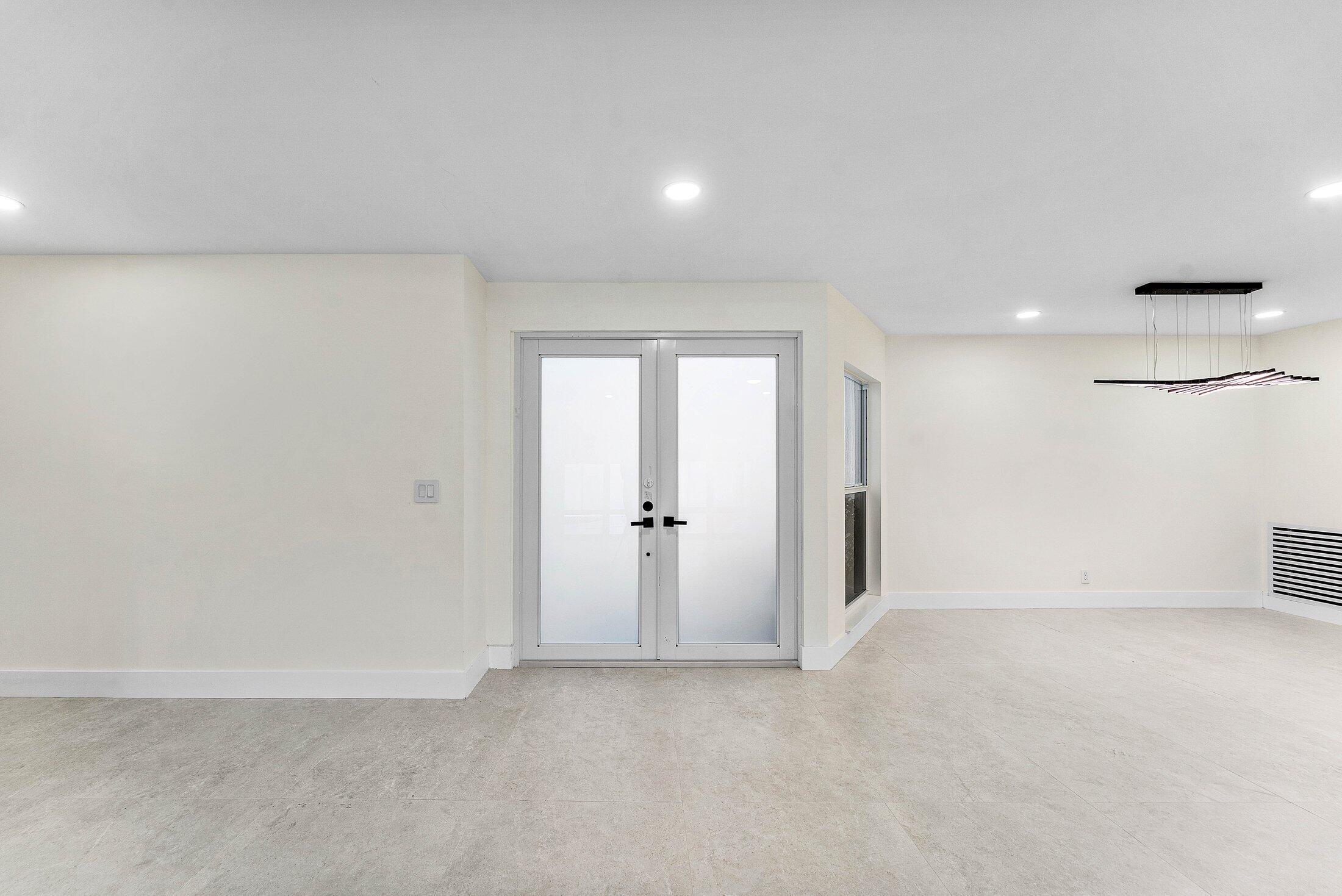 1380 Southwest 1st Street Boca Raton, FL 33486 - Photo 5 of 50 a view of an empty room