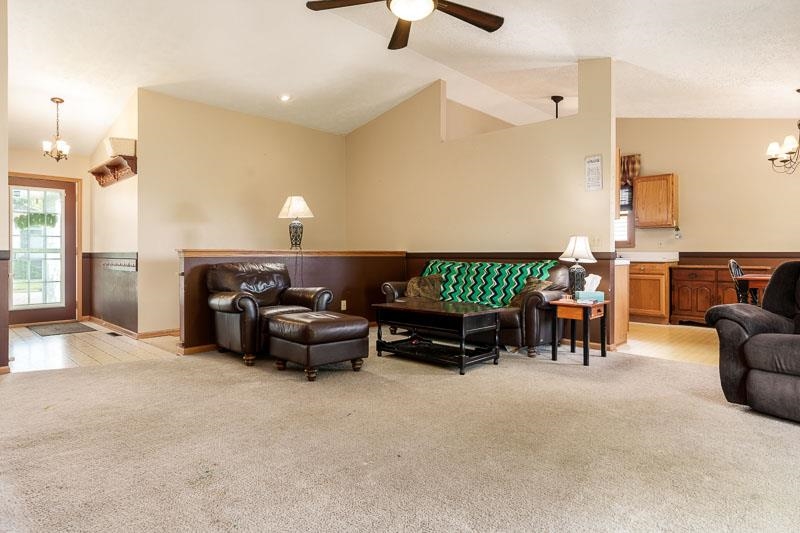 5406 Torque Road Loves Park, IL 61111 - Photo 15 of 40 a living room with furniture and a fireplace