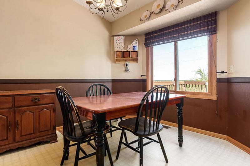 5406 Torque Road Loves Park, IL 61111 - Photo 17 of 40 a view of a dining room with furniture window and outside view