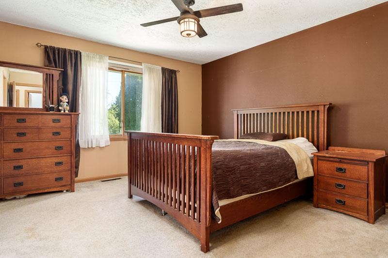 5406 Torque Road Loves Park, IL 61111 - Photo 25 of 40 a bed room with a bed and a window