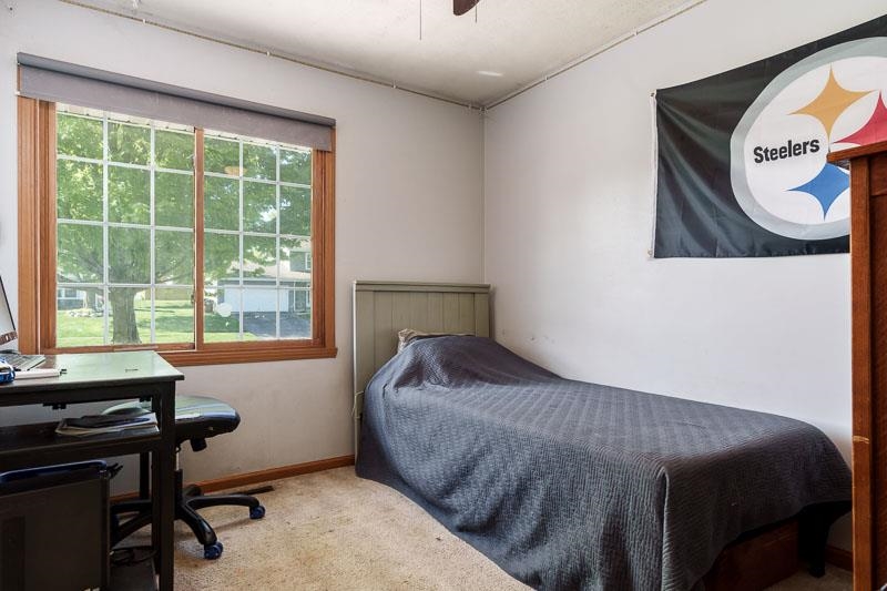 5406 Torque Road Loves Park, IL 61111 - Photo 32 of 40 a bedroom with a bed and a window