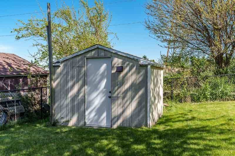 5406 Torque Road Loves Park, IL 61111 - Photo 6 of 40 a backyard of a house with lots of green space
