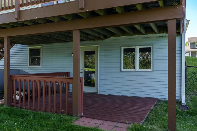 5406 Torque Road Loves Park, IL 61111 - Photo 8 of 40 a view of a house with wooden deck