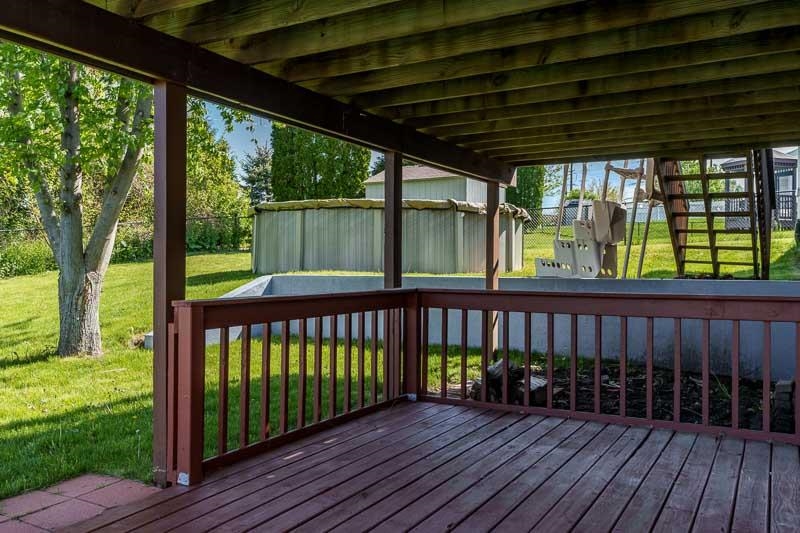 5406 Torque Road Loves Park, IL 61111 - Photo 9 of 40 a view of a wooden deck
