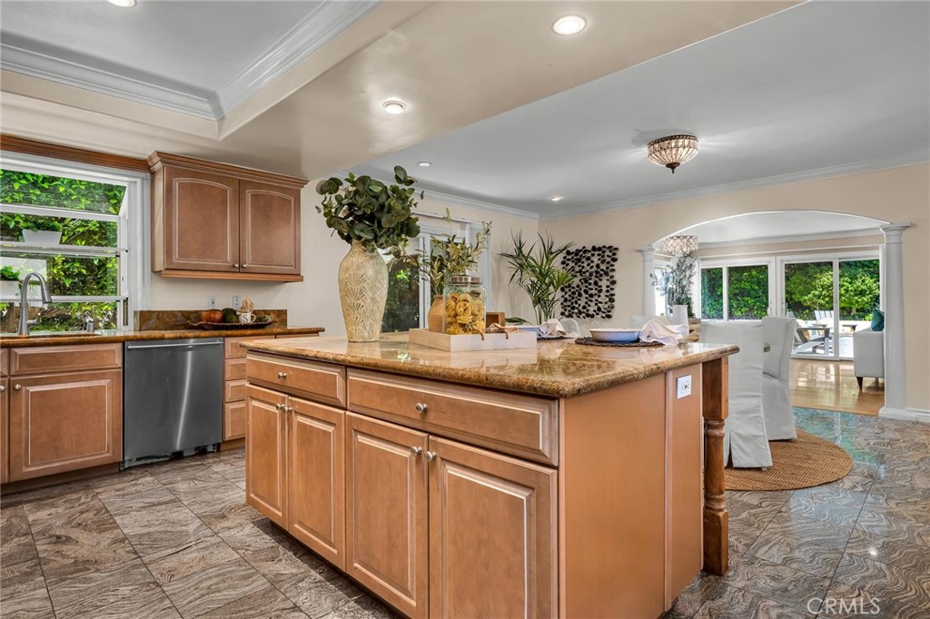 28084 Ella Road Rancho Palos Verdes, CA 90275 - Photo 13 of 38 a kitchen with stainless steel appliances granite countertop a sink and cabinets