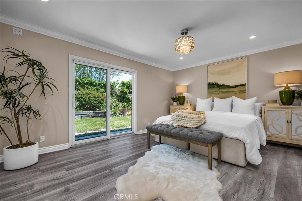 28084 Ella Road Rancho Palos Verdes, CA 90275 - Photo 15 of 38 a bedroom with furniture and a potted plant