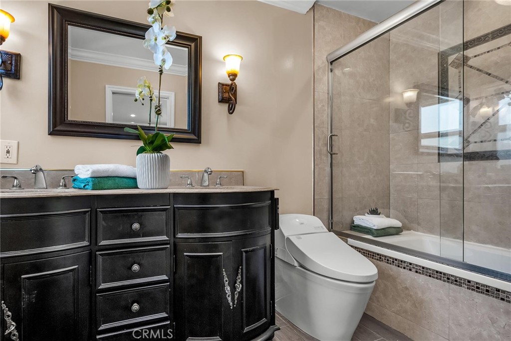28084 Ella Road Rancho Palos Verdes, CA 90275 - Photo 17 of 38 a bathroom with a sink a toilet and shower