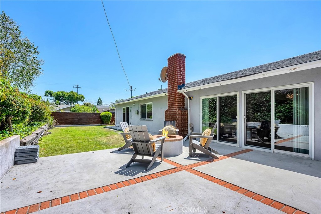 28084 Ella Road Rancho Palos Verdes, CA 90275 - Photo 27 of 38 a view of a house with backyard sitting area and garden