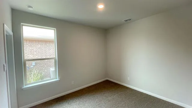 an empty room with a window