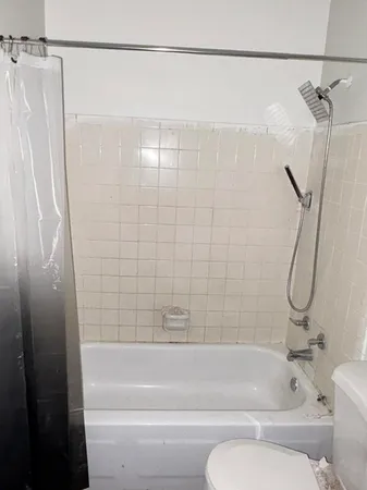 a close view of a sink and dishwasher in a kitchen