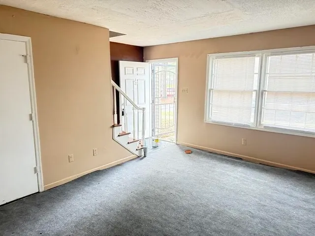 an empty room with windows