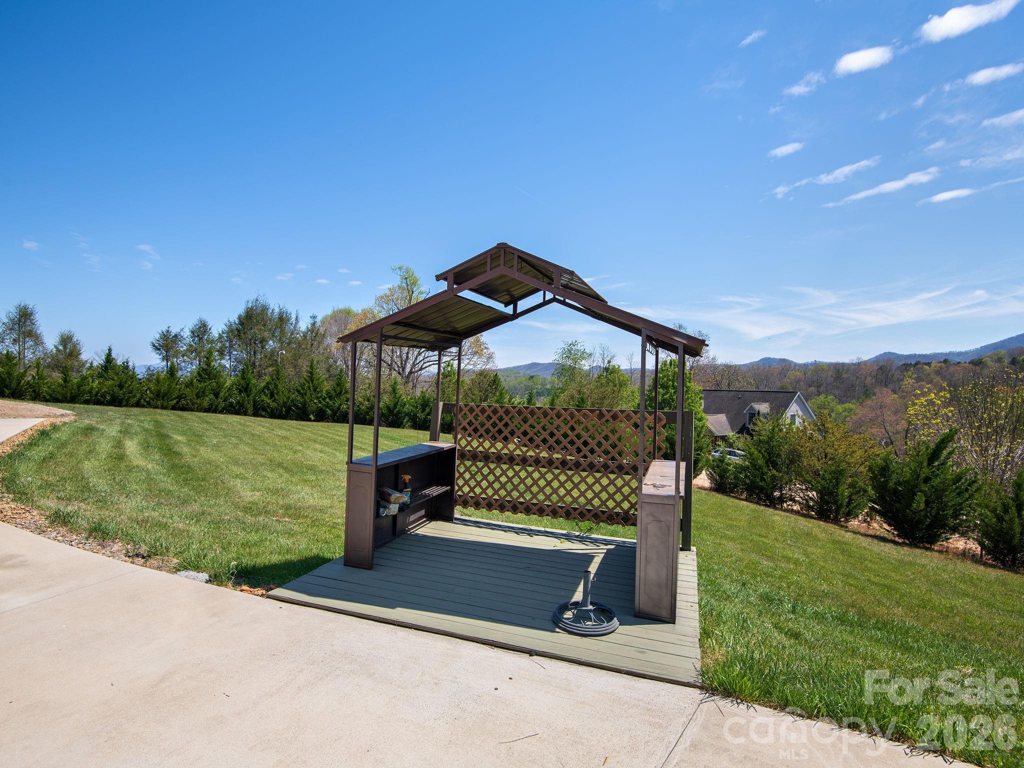 193 Youngs Cove Road Candler, NC 28715 - Photo 40 of 48 a front view of a house with a yard