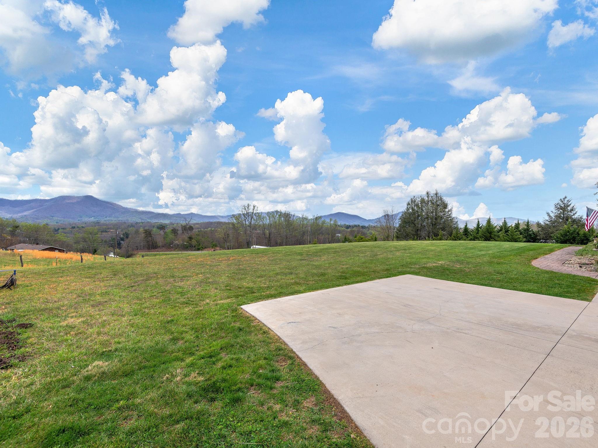 193 Youngs Cove Road Candler, NC 28715 - Photo 45 of 48 a view of a lake