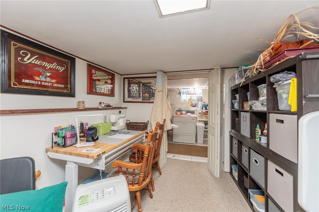 5364 Summit Road Lyndhurst, OH 44124 - Photo 8 of 42 Carpeted recreational room with built-in shelving and a work desk