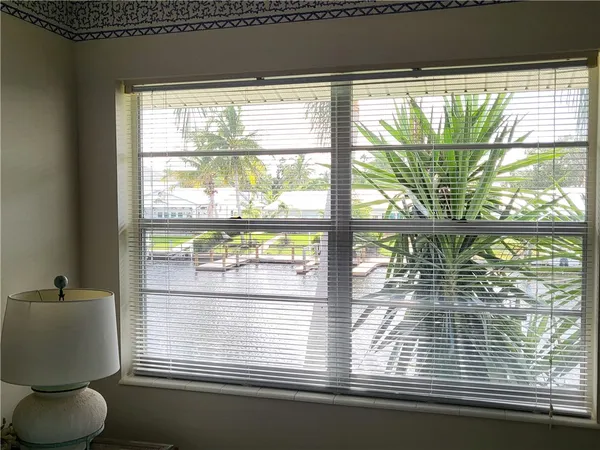 a kitchen with stainless steel appliances granite countertop a stove sink and cabinets