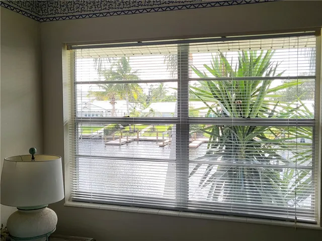 a kitchen with stainless steel appliances granite countertop a stove sink and cabinets