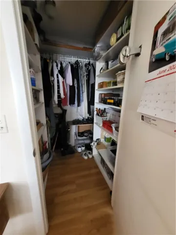 a bedroom with a bed and a table in it