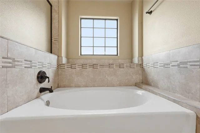 a bathroom with a bathtub