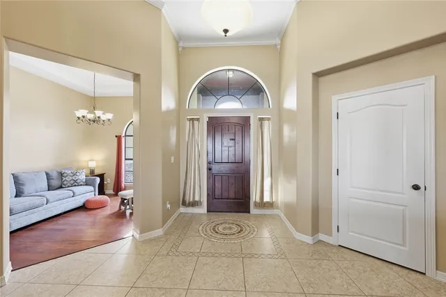 a view of a livingroom with furniture and windows