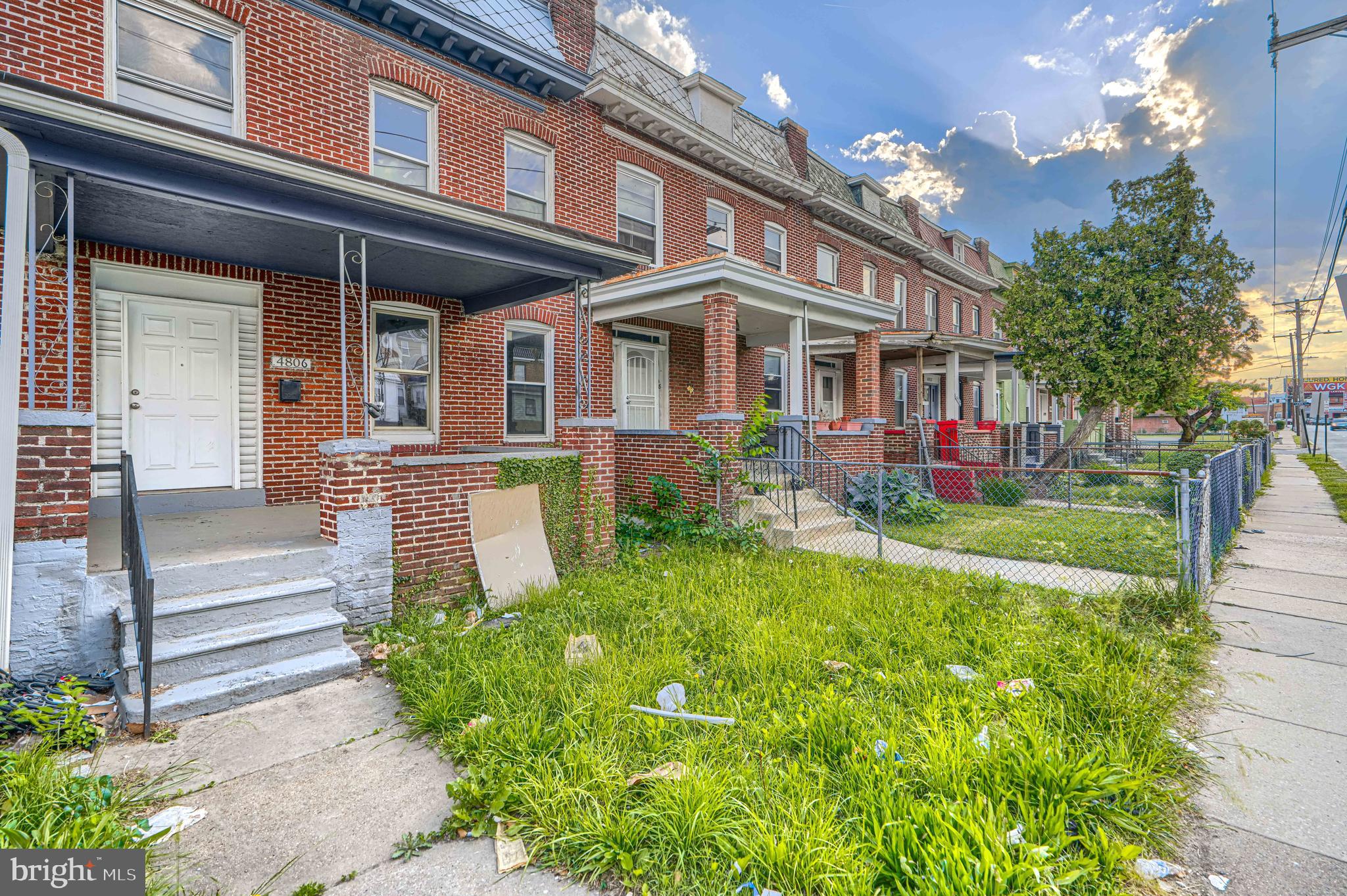 4806 Reisterstown Road Baltimore, MD 21215 - Photo 1 of 34 front view of a house with a yard