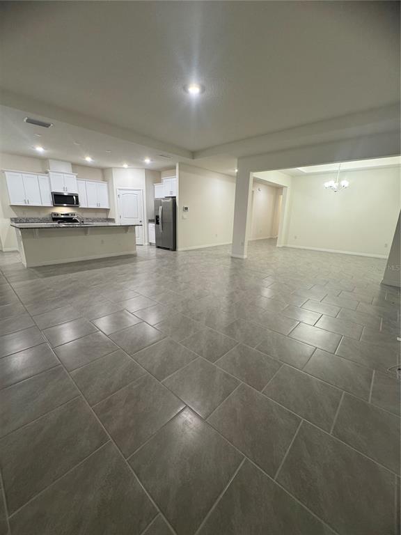 1729 Bull Hill Road Kissimmee, FL 34744 - Photo 1 of 34 a view of a kitchen with a sink and cabinets