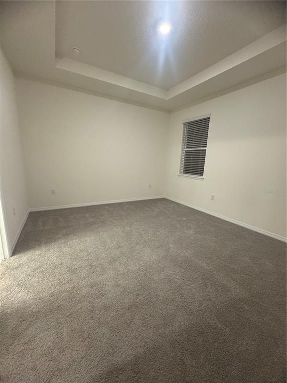 1729 Bull Hill Road Kissimmee, FL 34744 - Photo 18 of 34 an empty room with a empty space and a window