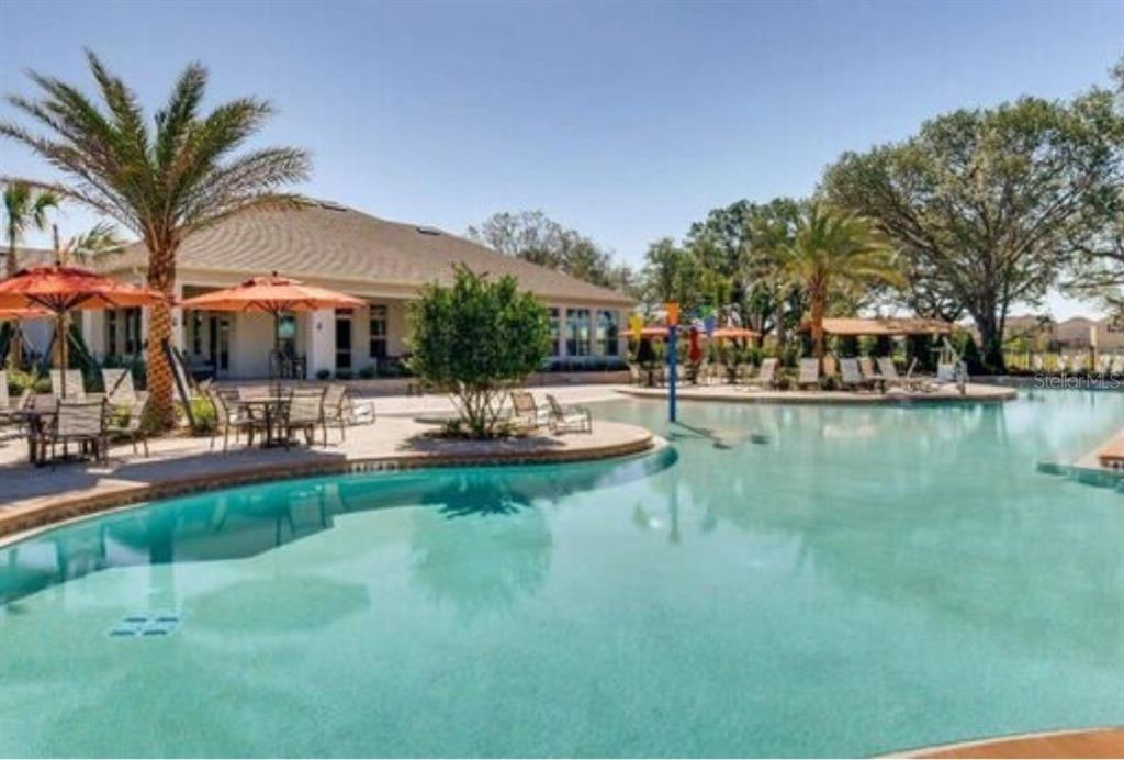 1729 Bull Hill Road Kissimmee, FL 34744 - Photo 26 of 34 a swimming pool with outdoor seating and yard