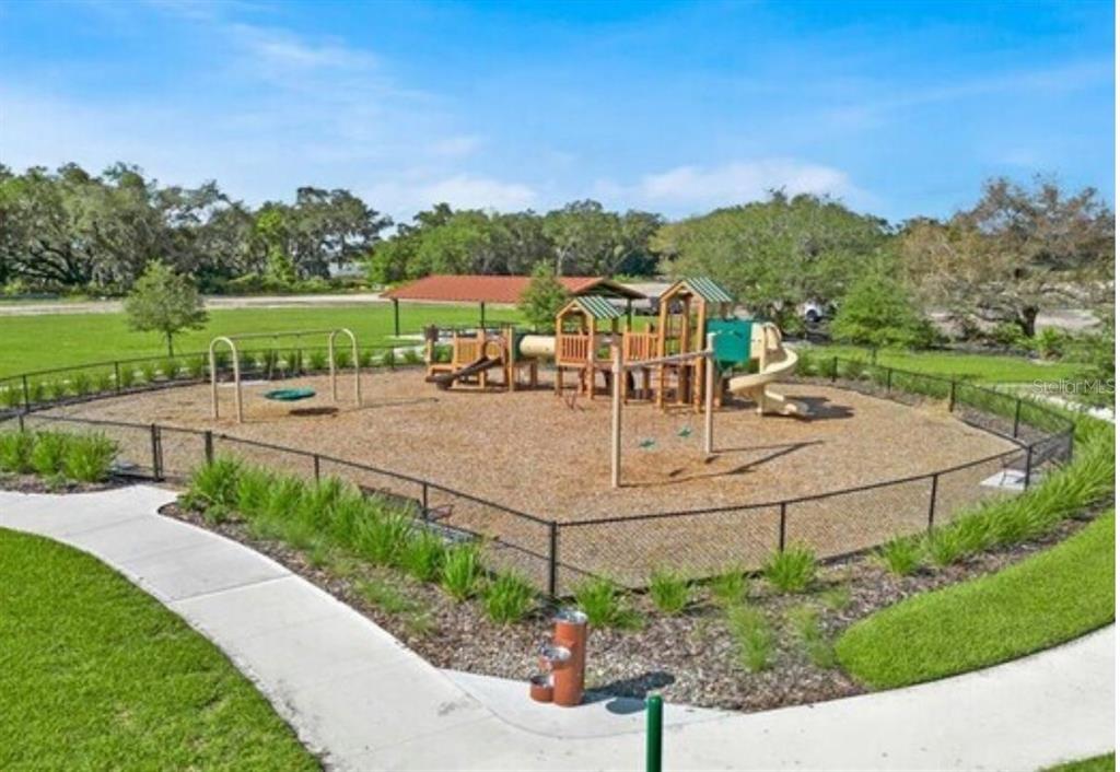 1729 Bull Hill Road Kissimmee, FL 34744 - Photo 30 of 34 a view of a swimming pool with a patio