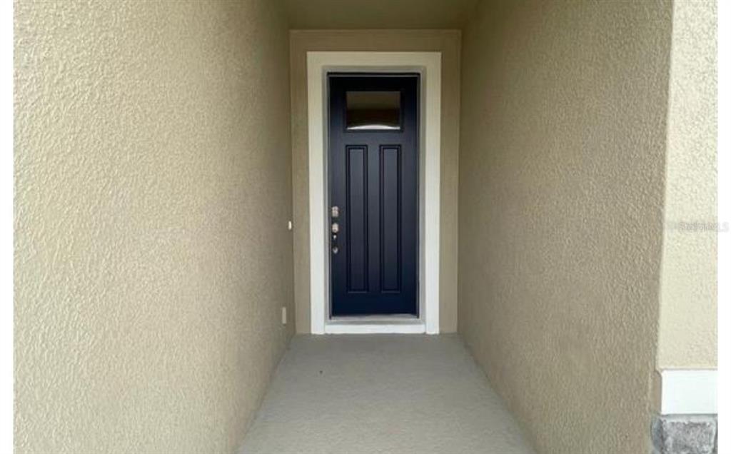 1729 Bull Hill Road Kissimmee, FL 34744 - Photo 33 of 34 a view of an front door
