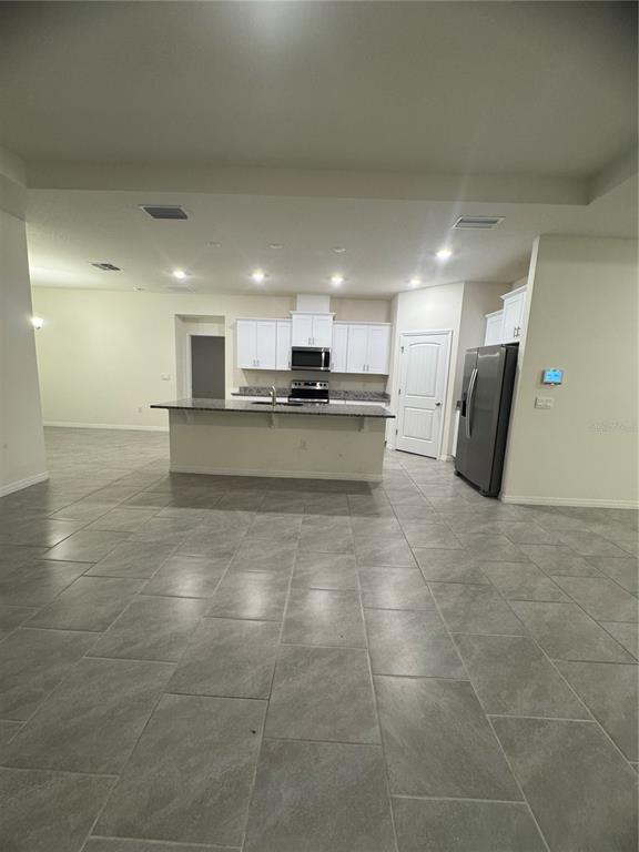 1729 Bull Hill Road Kissimmee, FL 34744 - Photo 4 of 34 a view of a kitchen with a sink