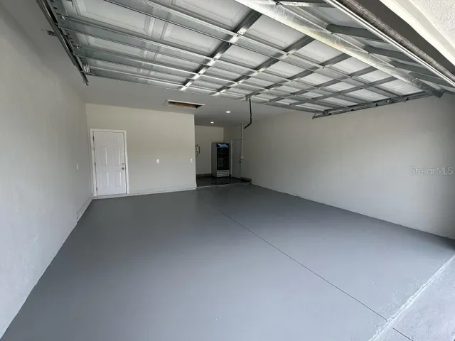 a view of a room with an empty space