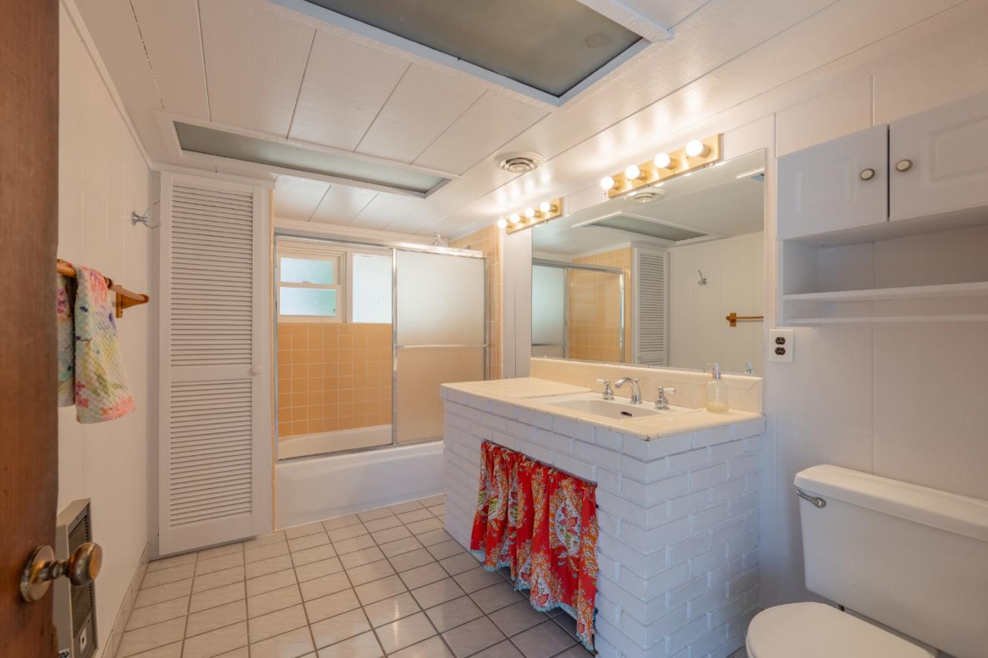 72 Los Laureles Grade Road Carmel Valley, CA 93924 - Photo 21 of 43 a bathroom with a toilet sink and mirror