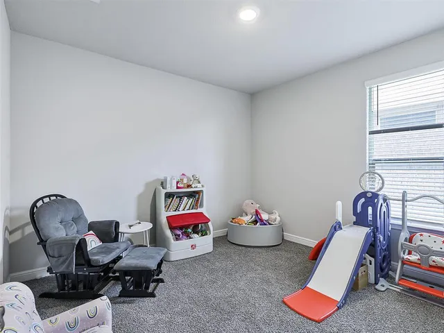 a room with furniture and toys