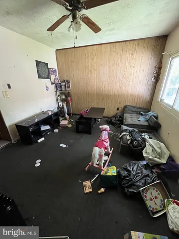 a room with furniture and a window