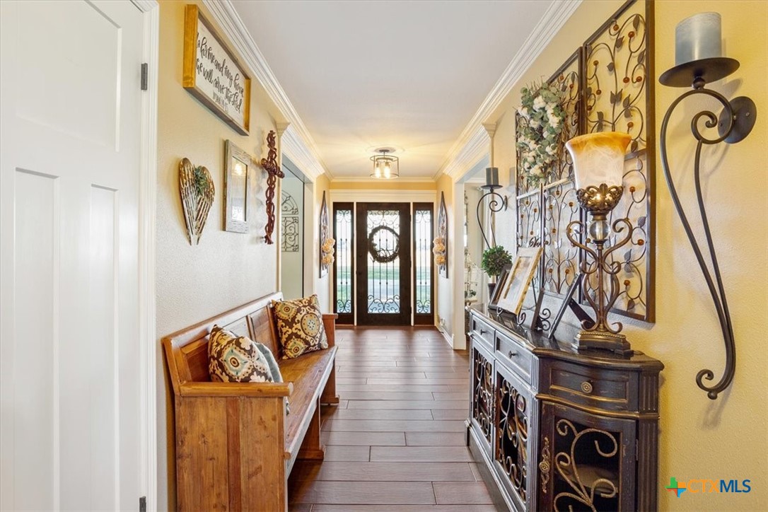 6409 3 Forks Road Belton, TX 76513 - Photo 11 of 40 a view of an entryway with wooden floor