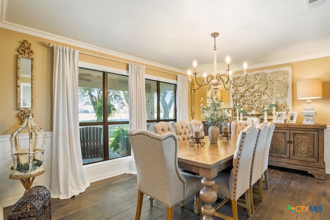 6409 3 Forks Road Belton, TX 76513 - Photo 13 of 40 a view of a dining room with furniture window and wooden floor