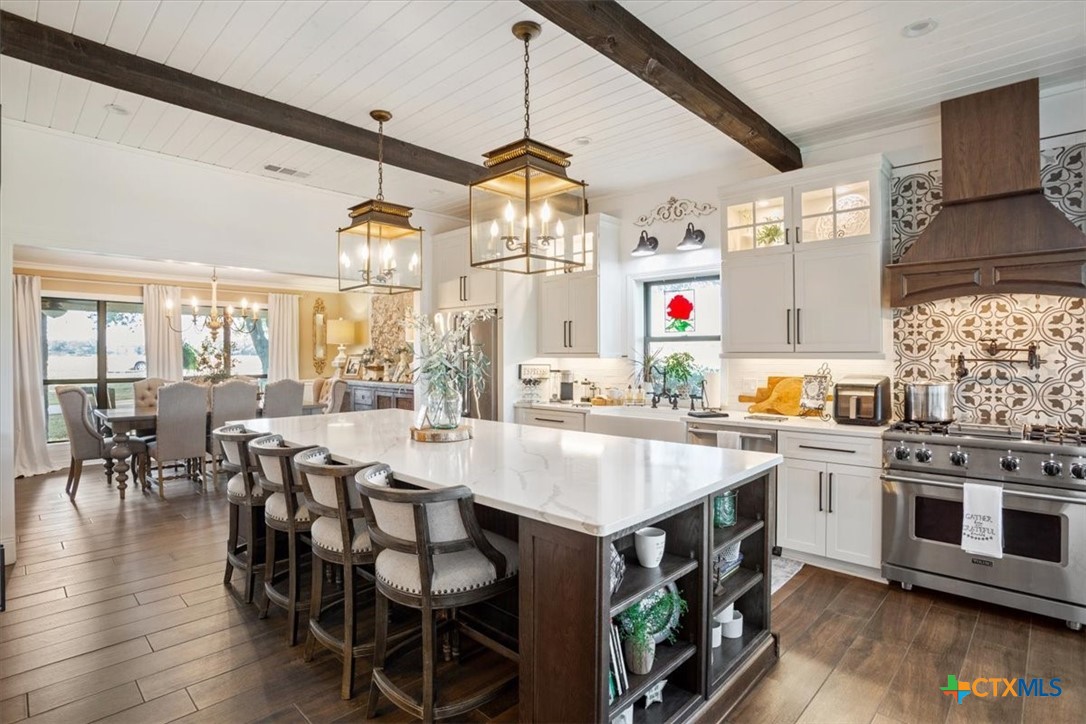 6409 3 Forks Road Belton, TX 76513 - Photo 21 of 40 a view of kitchen with furniture and wooden floor