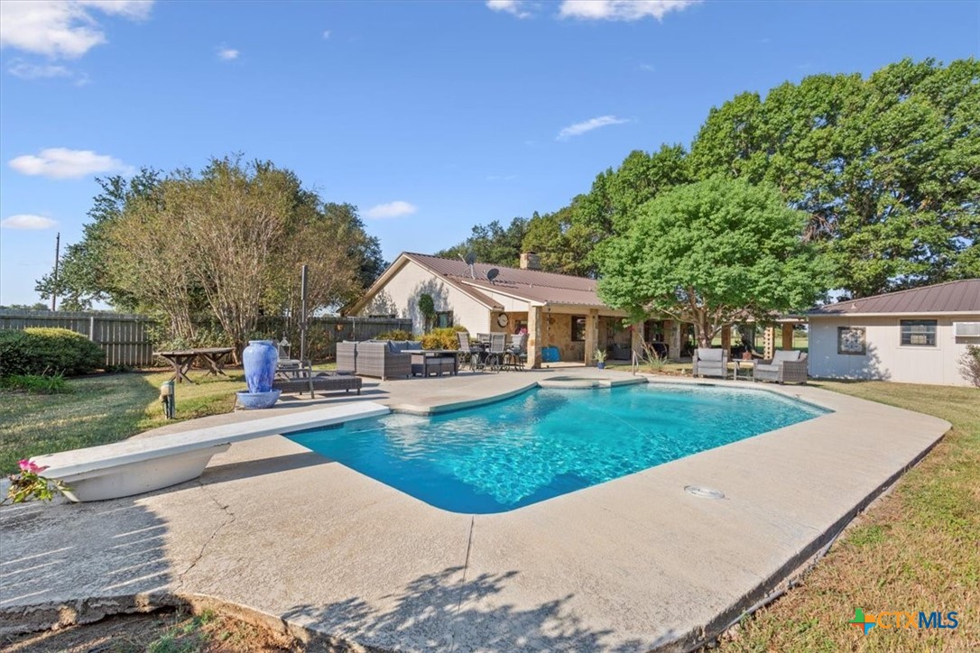 6409 3 Forks Road Belton, TX 76513 - Photo 37 of 40 a view of a house with garden and a trees