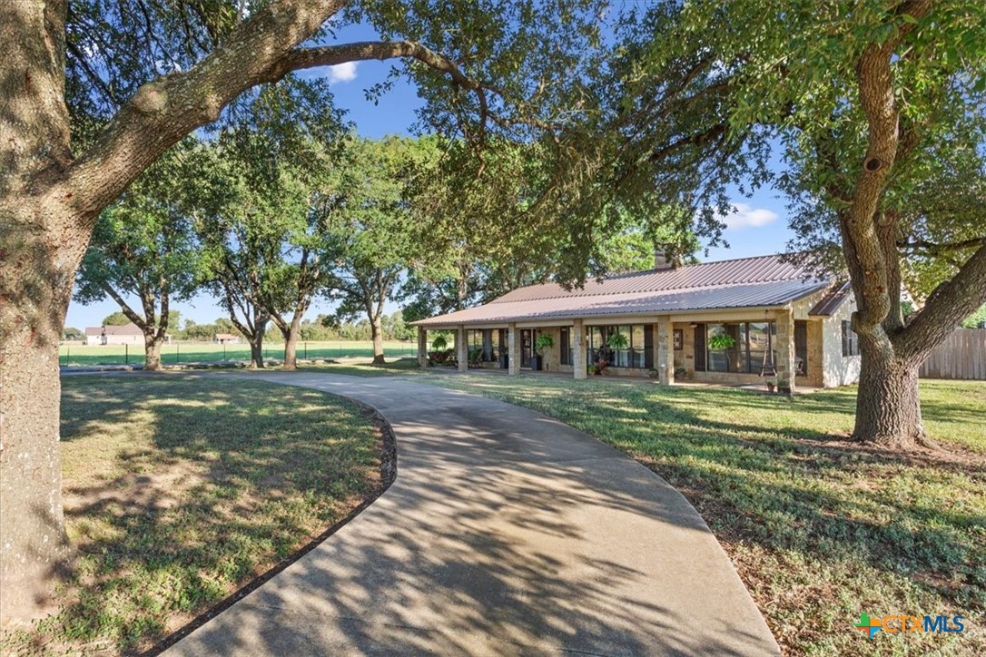 6409 3 Forks Road Belton, TX 76513 - Photo 7 of 40 a view of a house with a yard