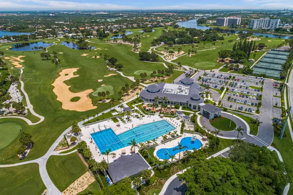an aerial view of multiple house with outdoor space