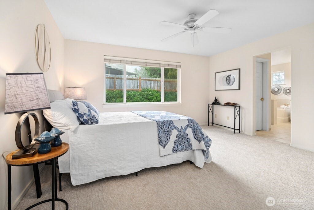 1807 Northeast 26th Place Renton, WA 98056 - Photo 22 of 38 a living room with furniture and a window