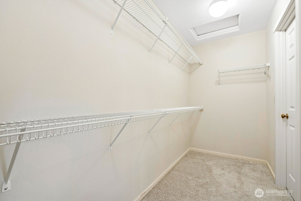 1807 Northeast 26th Place Renton, WA 98056 - Photo 25 of 38 a view of small space with racks on the wall