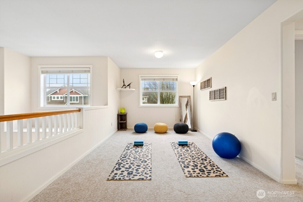 1807 Northeast 26th Place Renton, WA 98056 - Photo 26 of 38 a bedroom with furniture and a window