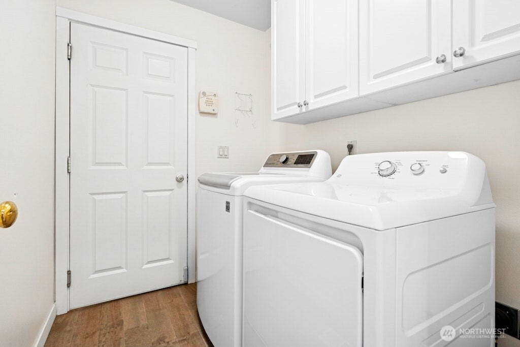 1807 Northeast 26th Place Renton, WA 98056 - Photo 29 of 38 a utility room with dryer and washer