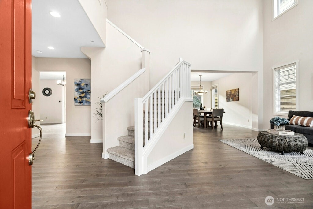1807 Northeast 26th Place Renton, WA 98056 - Photo 5 of 38 a view of entryway and hall with wooden floor